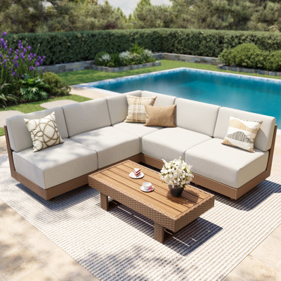 Ensemble de conversation d'extérieur en osier avec coussins, canapé modulaire d'extérieur en forme de L beige en PEHD pour 4 personnes