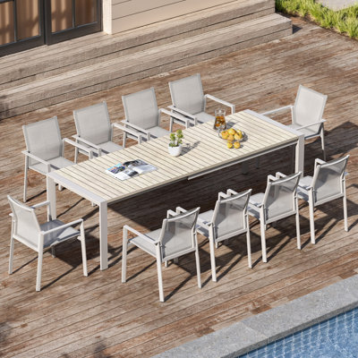 Ensemble de salle à manger d'extérieur extensible 11 pièces, table extensible en aluminium de 216 à 272 cm avec plateau imitation bois et 10 chaises empilables, mobilier de patio pour 10 personnes, jardin, terrasse et bord de piscine