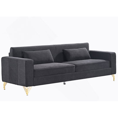 Luxueux canapé en velours pour le salon, rehaussant le confort et le style