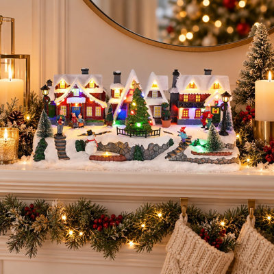 Maison de village de Noël lumineuse de 15,9 pouces, pour la famille, les amis, les collectionneurs de village de Noël et tous ceux qui aiment la décoration saisonnière traditionnelle.