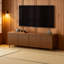 Meuble télé moderne avec portes cannelées et centre de divertissement, console multimédia avec rangement dissimulé et poignées en métal