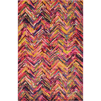 Tapis rose / mauve / rouge à motif de chevrons Shirey