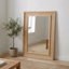 Miroir décoratif en rotin