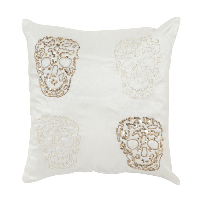 Coussin quatre crâne