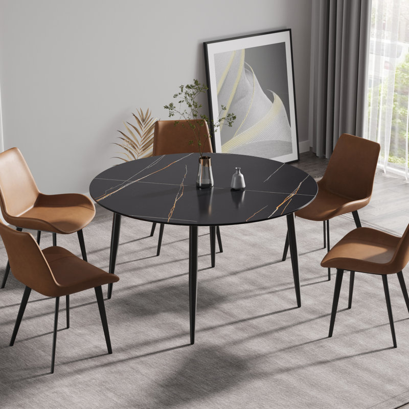 Table de salle à manger ronde de 53,15 po en pierre artificielle noire avec pieds en métal pouvant accueillir 6 personnes.