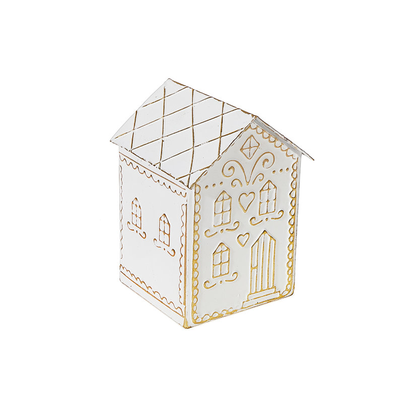 Maison de pain d'épices dorée et blanche