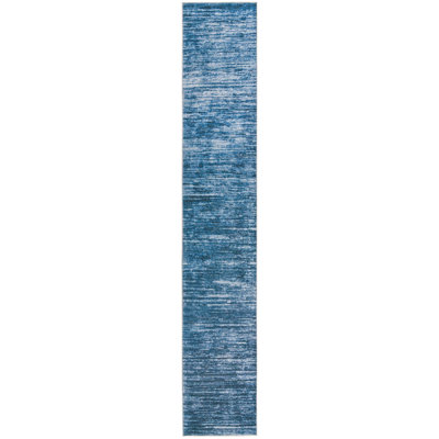 Tapis contemporain de couleur bleue Ikhasa