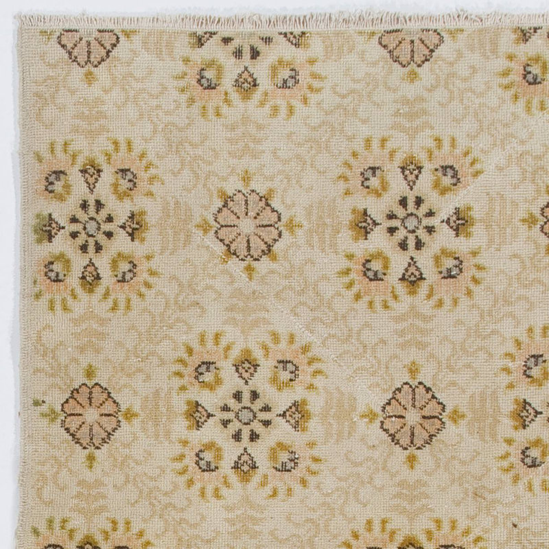 Tapis turc vintage en laine à motif floral fait à la main