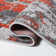 Drury Looped/Hooked Orange Rug