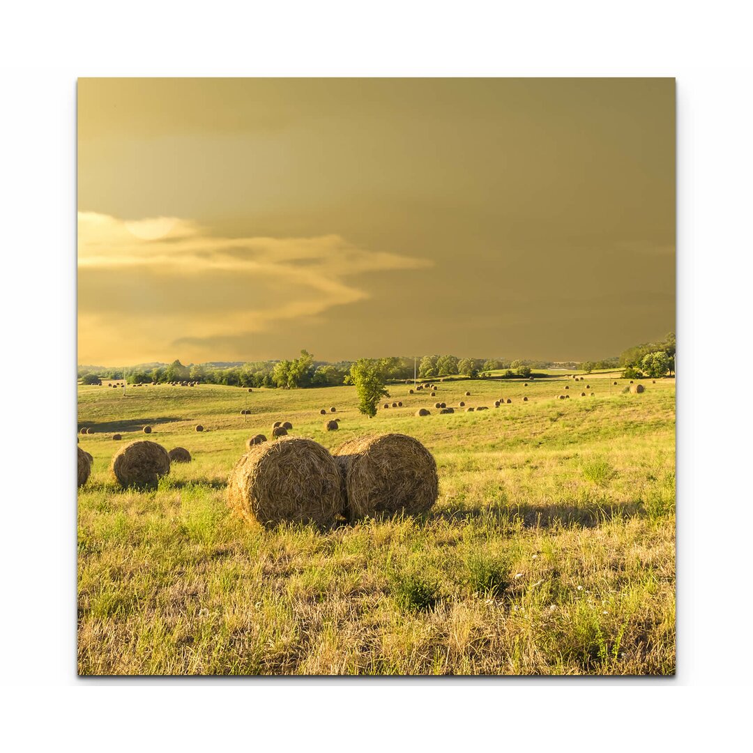 Leinwandbild Heuballen auf einem Feld in der Toskana