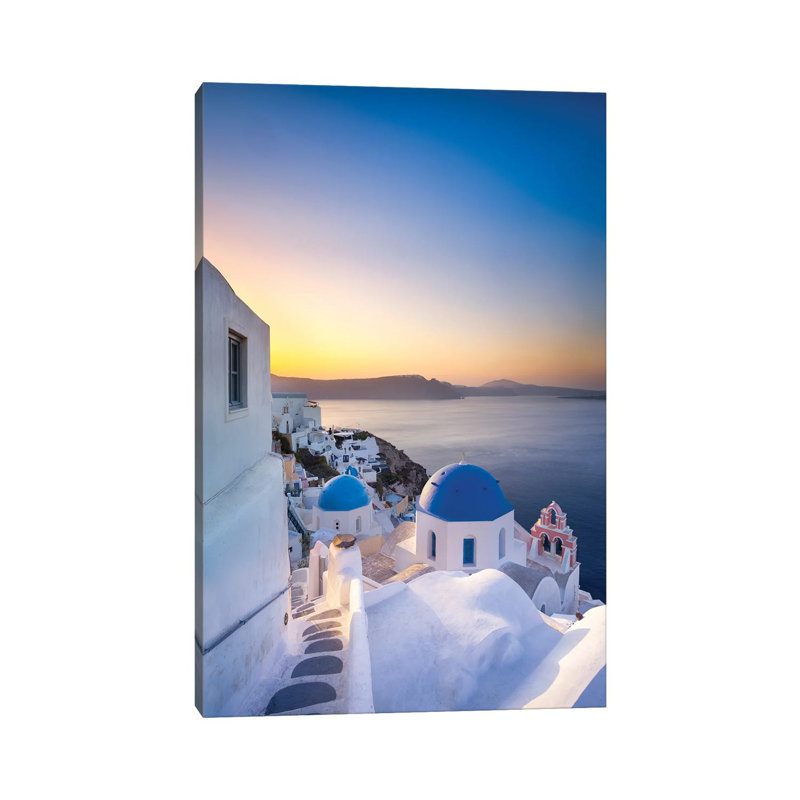 Sunrise Over The Blue Rooftops In Oia, Santorini, Greece by Jan Becke - Wrapped Canvas Print