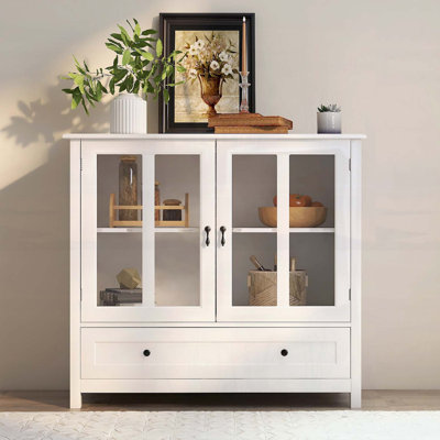 Buffet polyvalent avec portes vitrées doubles et poignées cloche originales pour une présentation et un rangement élégants