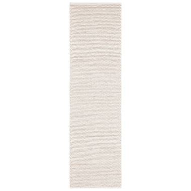 Charvik Solid Color Handmade Area Rug in Ivory