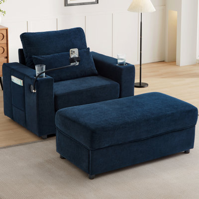 Fauteuil bleu avec rangement mobile, charge, porte-gobelets et poches latérales pour les petits espaces de détente - échelle compacte, doubles espaces de vie