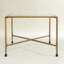 Table basse moderne en verre avec cadre en métal doré