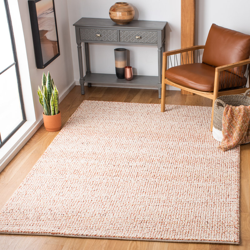 Ivory and Rust Tufted Wool 6' x 9' Area Rug