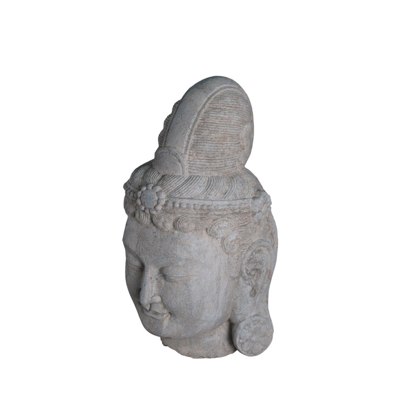 A Stone Statue Of Guanyin Head