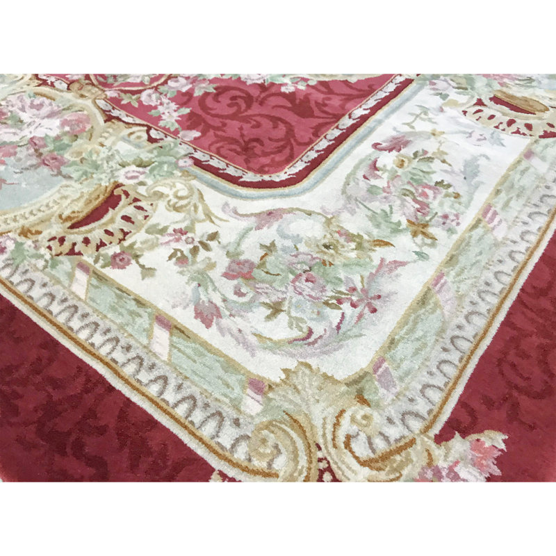 Tapis rouge et ivoire noué à la main de haute qualité