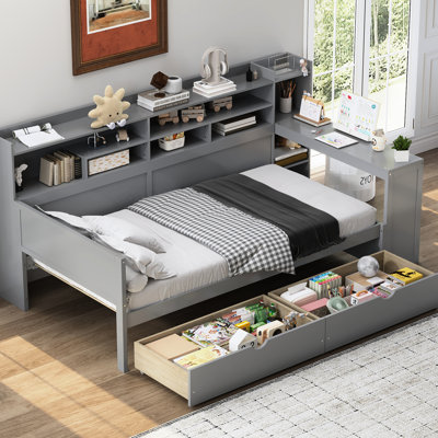 Lit de jour simple gris en bois avec plusieurs rangements, deux tiroirs et un bureau d'étude fonctionnel pour la productivité de la chambre à coucher