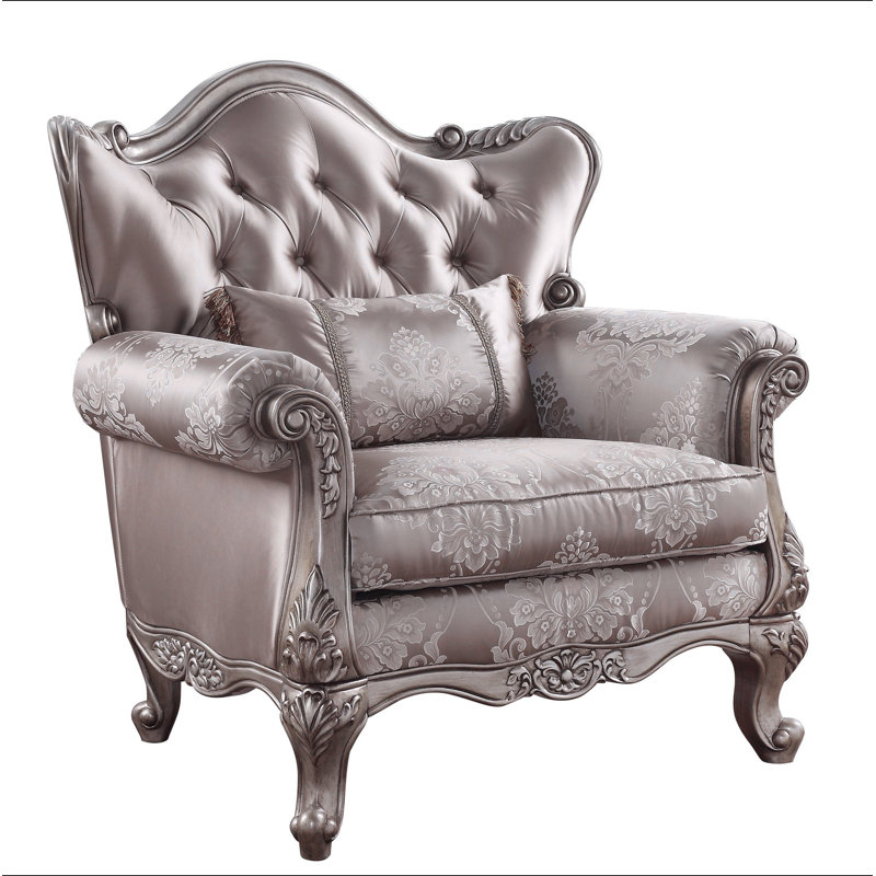 Chaise en tissu et champagne avec coussin