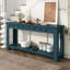 Console élégante en bois massif, fini bleu foncé, idéale pour une entrée. Elle offre des options de rangement.