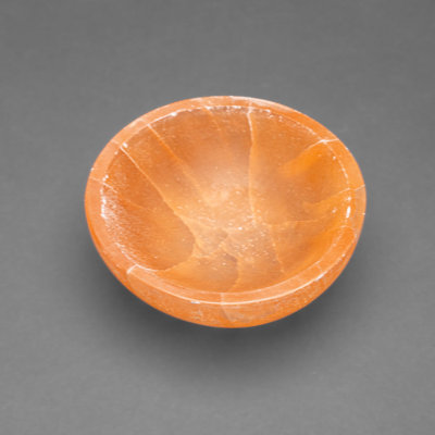 Véritable petit plat en sélénite orange poli véritable du Maroc
