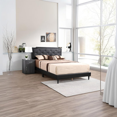 Élégant grand lit noir pour les chambres modernes
