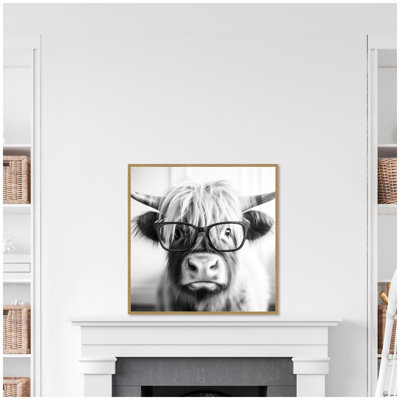 Black and White Highland Cow in Reading Glasses by The Creative Bunch Studio Framed Canvas Wall Art Print