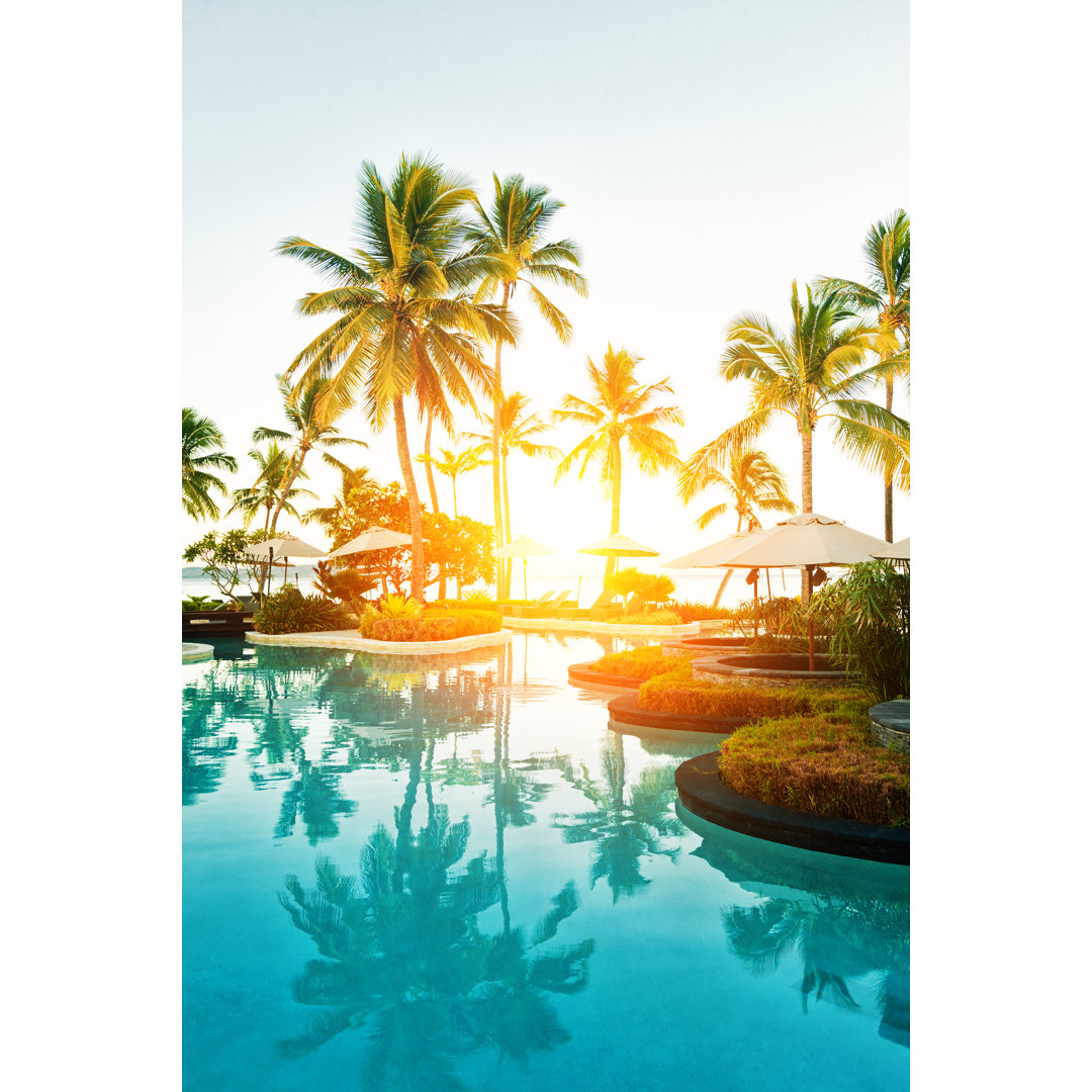 Tropical Resort Poolside At Sunset von Jhorrocks - Kunstdrucke ohne Rahmen auf Leinwand