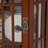 Corner Curio Cabinet With 4 Adjustable Tempered Glass Shelves And Lighting System, Solid Wood Legs,Acrylic Mirrored Back Panel(E26 Light Bulb Not Included)