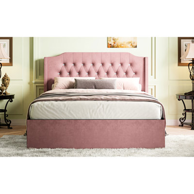 Grand lit tapissier avec boutons en cristal, tête de lit à oreilles et espace de rangement, housse en tissu rose de couleur rose