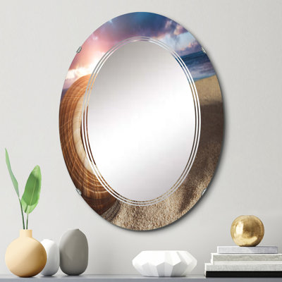 Grand coquillage dans le sable I - Miroir mural nautique et côtier ovale