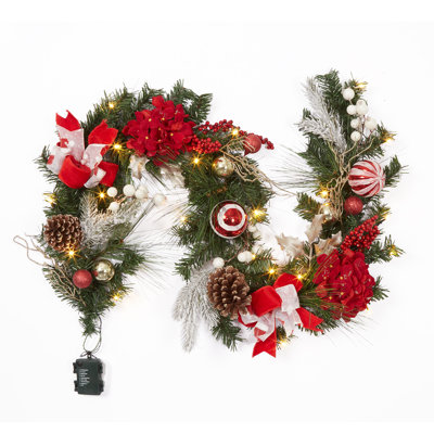 Guirlande de Noël lumineuse de 1,80 m avec pin artificiel, nœuds, fleurs, baies, boules décoratives, 20 DEL à piles, 8 modes d'éclairage et minuterie - Décoration pour foyer, porte, porche, rouge et blanc