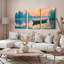 Ensemble de 3 tableaux sur toile représentant un coucher de soleil sur un lac avec bateau et nénuphars-884556419