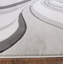 Tapis moderne à motif de tourbillons sculptés à la main gris argenté moelleux