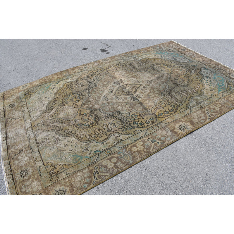 Tapis turc rétro avec d'élégants motifs de tons de terre parfaits pour un décor intemporel bleu / brun