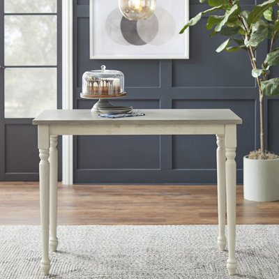 Jaydin Rectangular with Solid Wood Base Dining Table