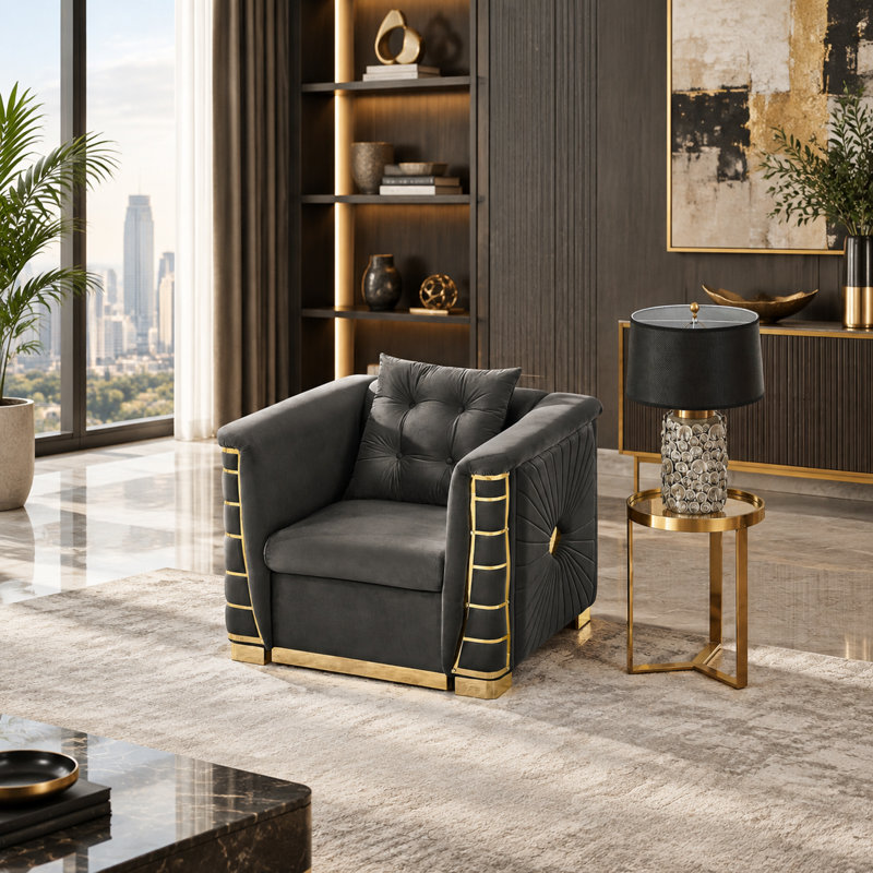 Fauteuil une place en velours italien avec des détails métalliques dorés et un coussin décoratif