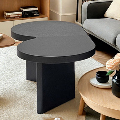 Table basse en bois massif en forme de papillon