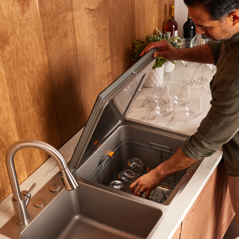 Lave-vaisselle compact 3 en 1 à chargement par le haut, intégré à l'évier et au nettoyeur de fruits et légumes. 4 modes de lavage : lavage, désinfection et séchage. Conception compacte, idéale pour les petites cuisines, les appartements et les camping-cars.