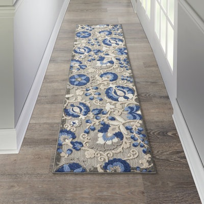 Tapis à motif floral moderne et naturel Newton