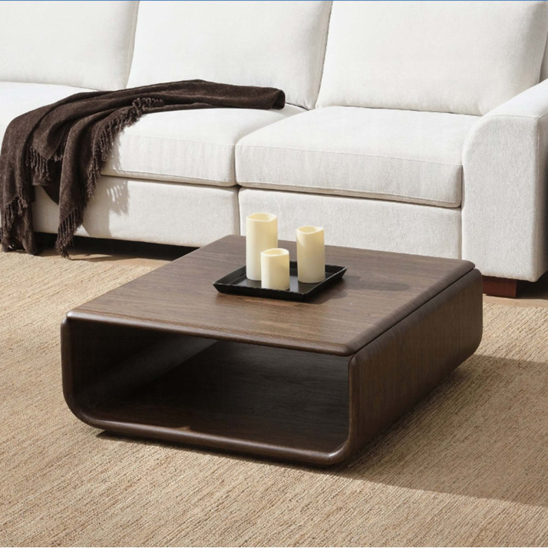 Table basse courbée avec rangement ouvert