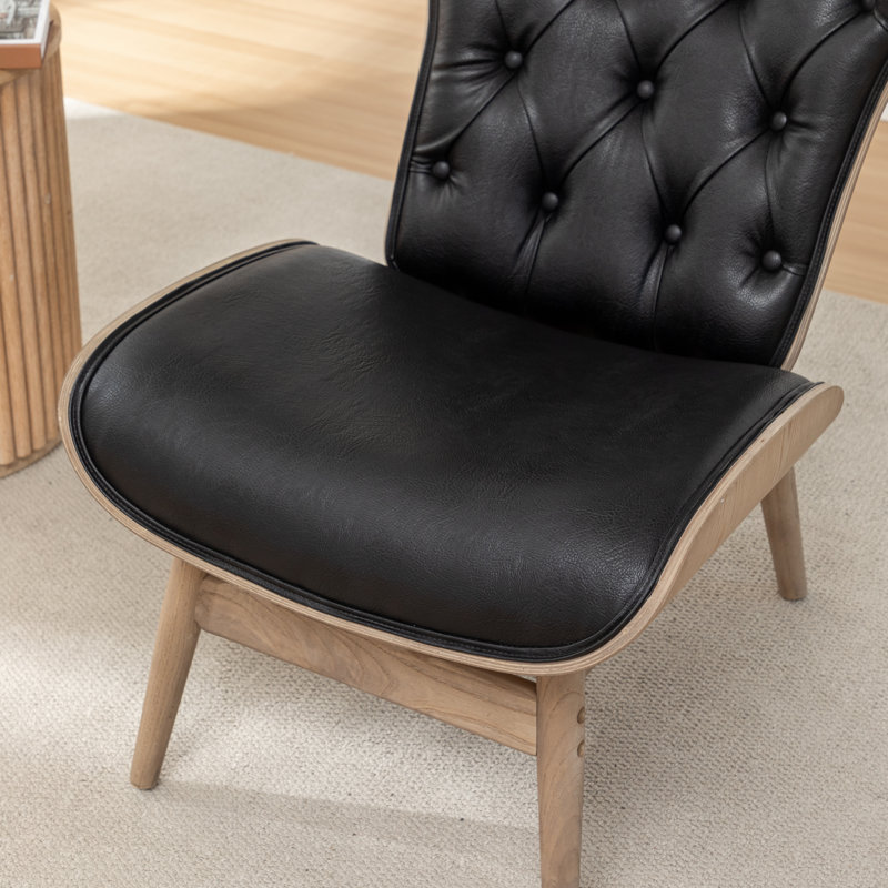 Fauteuil à oreilles en cuir Khamisi