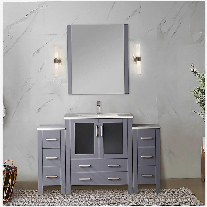 Lavabo pour salle de bain simple avec armoire latérale, comptoir en céramique blanche et ensemble de robinet