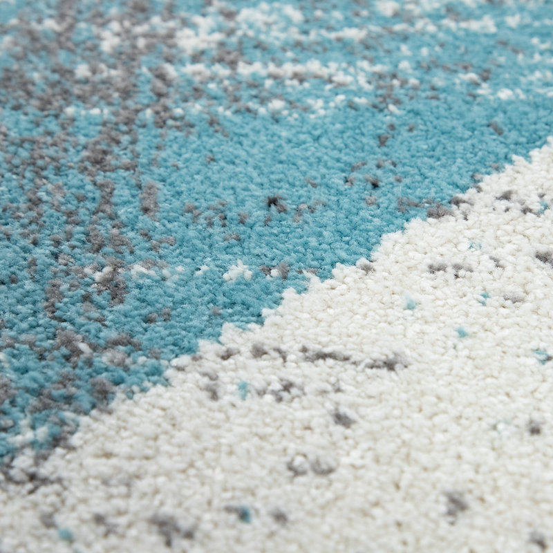 Tapis turquoise / gris / crème à motif abstrait en polypropylène tissé à la machine Everline