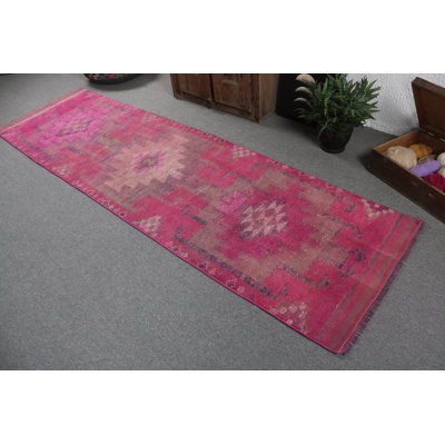 Exotic Vintage Turkish Area Rug features a captivating Pink Geometric Pattern for Home Decor