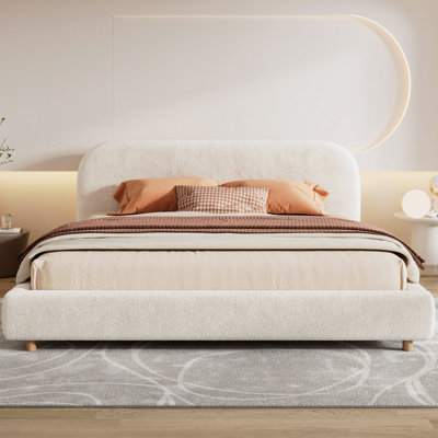 Lit sur plateforme rembourrÃ© avec tÃªte de lit incurvÃ©e et tissu Keo Loop