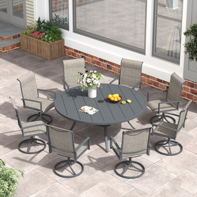 Outdoor Patio Dining Set with 8-person Round Dining Table and Padded Swivel Chairs by Wildon Home