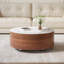 Table basse ronde moderne mobile de 29,5 po avec plateau en pierre frittée à motif marbré, 2 tiroirs et roulettes, finition noyer