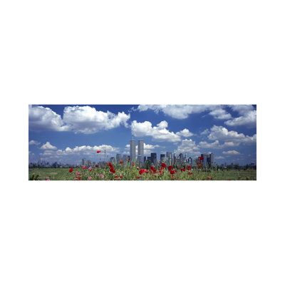 Flowers In A Park With Buildings In The Background, Manhattan, New York City, New York State, USA by Panoramic Images - Wrapped Canvas Panoramic Print